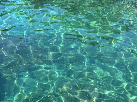 Sea water ocean clear blue turquoise paradise lagoon transparent surface.