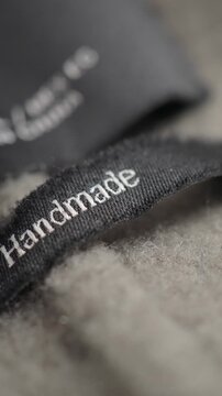Close-up of a handmade label on fabric