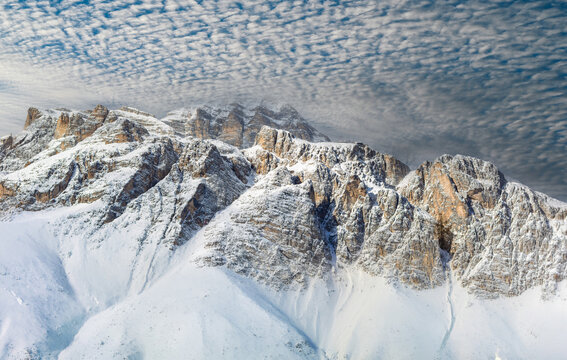 The mountain peaks turn white, offering a breathtaking view of the Tofane in Cortina d'Ampezzo.