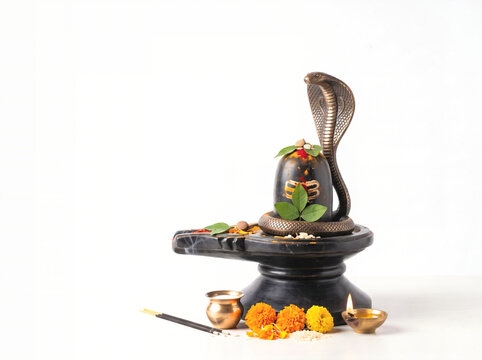 Lord Shiva Mahadeva Symbol Shivlinga with cobra snake, traditional Hindu puja Naag Panchami worship concept Background. 