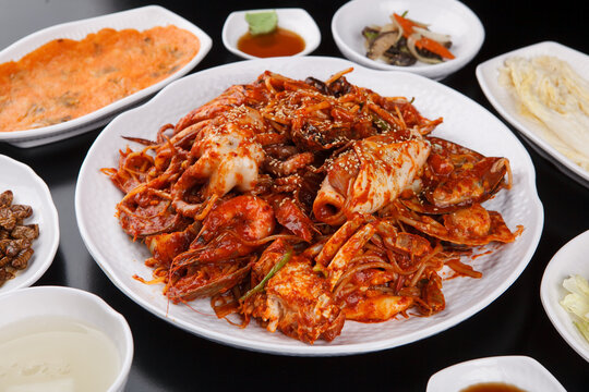 Korean spicy braised monkfish stew agujjim with bean sprouts