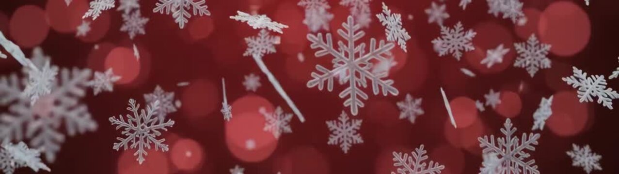 Snowflakes drifting against a warm christmas backdrop Winter theme for holidays and festive events.