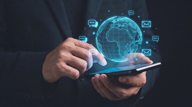 Business professional holding a glowing global network sphere. Digital transformation leader using futuristic tech for worldwide connectivity solut...