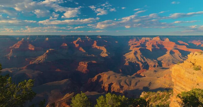 Grand Canyon Sunset with Dramatic Clouds and Golden Light, Arizona