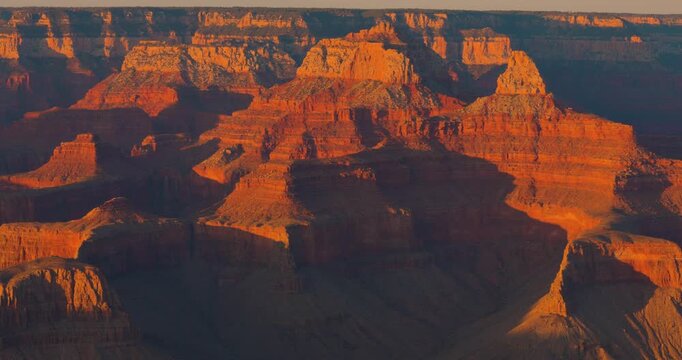 Grand Canyon Sunset with Dramatic Clouds and Golden Light, Arizona