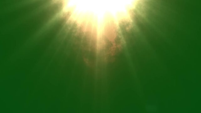 Golden sun rays light effect seamless loop isolated on green screen