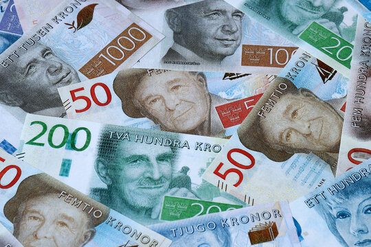 Swedish krona money bills in pile on table. Sweden SEK currency cash close up