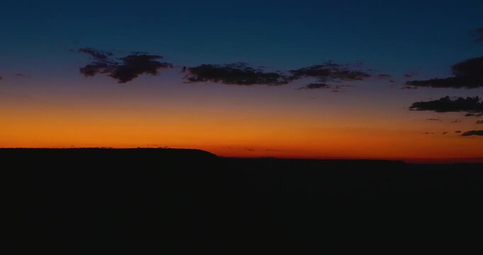 Grand Canyon Sunset with Dramatic Clouds and Golden Light, Arizona
