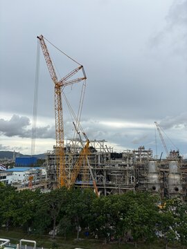 Heavy lift crawler crane at industrial plant construction site in Thailand