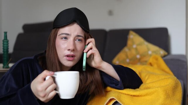 Coffee barely has time to cool as a young woman answers an early morning phone call interrupting her peaceful routine and quiet breakfast at home