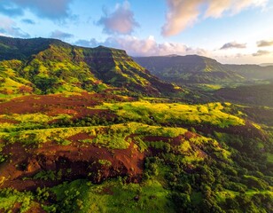 Obraz premium Aerial view of a lateritic Sahyadri plateau glowing with lush green vegetation, surrounded by rolling monsoon clouds.