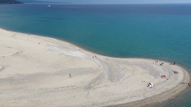 Aerial Reveal Shot of Possidi Beach Coastline and Sandspit in Halkidiki Greece