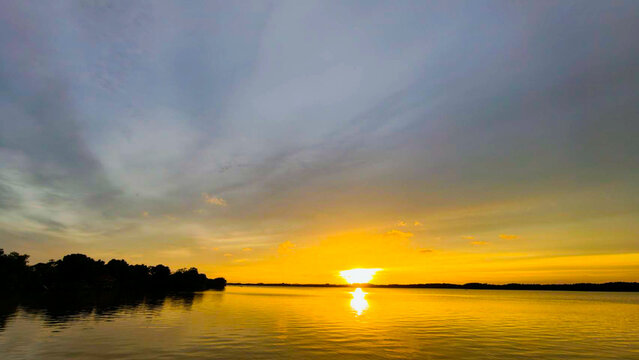 Golden Sunset Over Calm River Water