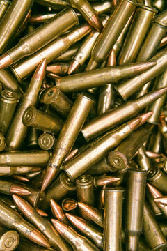 bullets for a gun as a background, closeup of photo