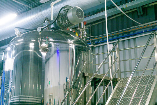 Stainless steel tanks for mixing and fermentation reactor in a modern factory