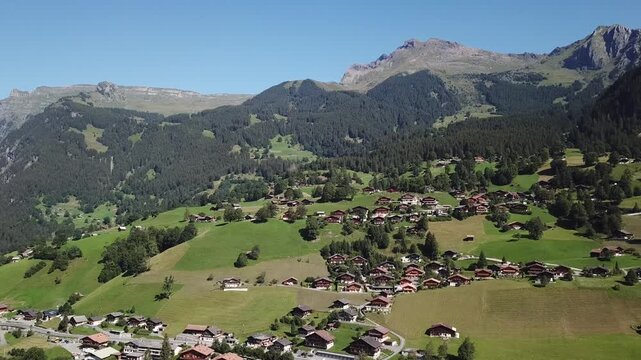 Famous village Grindelwald in swiss alps - starting point for train tours in the Jungfrau region
