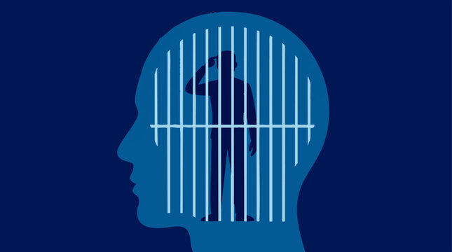 Mental prison concept, man trapped inside a human head silhouette behind bars