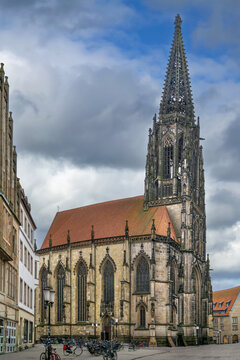 St. Lambert Church, Munster, Germany, side view. Historic late gothic architecture hallenkirche building under daytime sky
