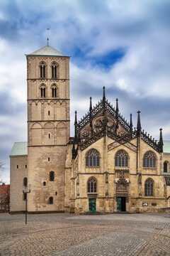 Munster Cathedral, Germany, side view from square. Historic gothic st paulus dom church building under daytime cloudy sky