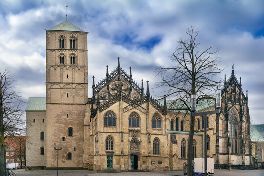 Munster Cathedral, Germany, side view from square. Historic gothic st paulus dom church building under daytime cloudy sky