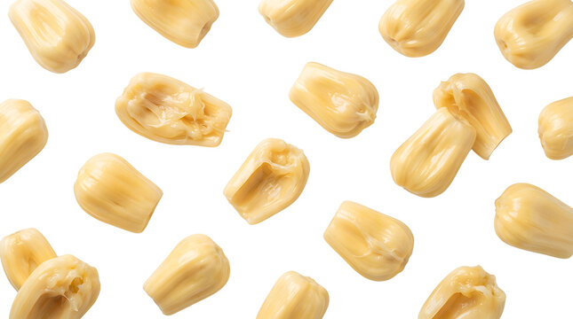 Close-up top view of many ripe yellow jackfruit pods scattered on a white background.