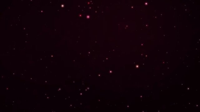 Ethereal shimmering red and gold particles slowly floating upwards creating a dark magical abstract cosmic