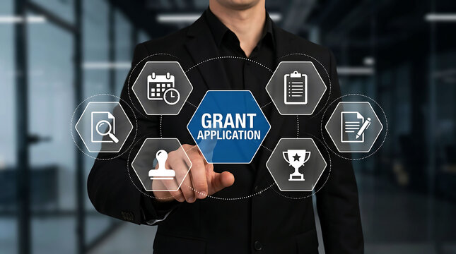 Businessman Using Digital Grant Application Management Dashboard for Funding Success