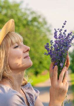 Woman with medicinal herbs. Selective focus.