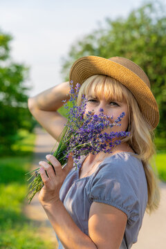 Woman with medicinal herbs. Selective focus.