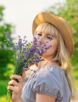 Woman with medicinal herbs. Selective focus.