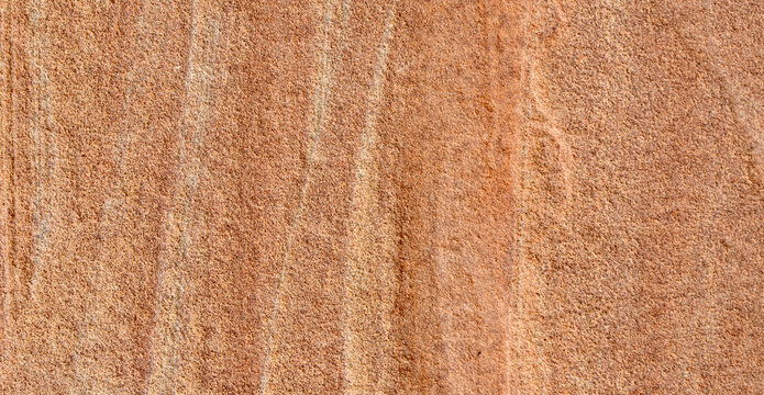 rough reddish brown sandstone surface texture background with natural subtle lines