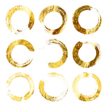 Golden grunge circles, brush strokes, lines, ink smudges, hand-drawn scribble shapes. Handmade sketchy marks, acrylic stains, charcoal streaks. Paint textures, dry brush effect. Vector illustration