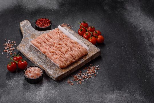 Fresh raw ground chicken, poultry meat for home cooking. Ground chicken