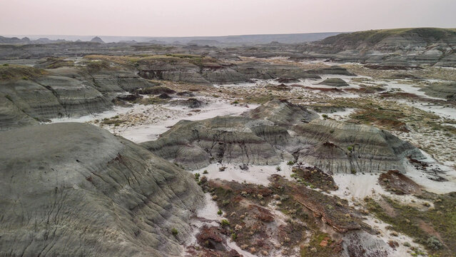 Panoramic drone shot of Dinosaur Provincial Park valley and river landscape