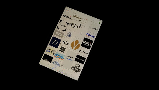 Tablet screen view with various sized Drakes logos, on a black background, August 1, 2026