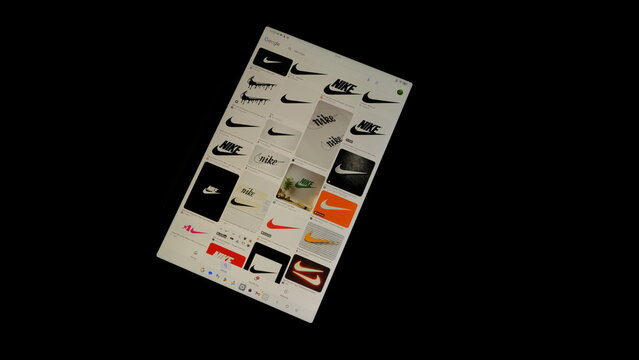 Tablet screen view with various sized Nike logos, on a black background, August 1, 2026