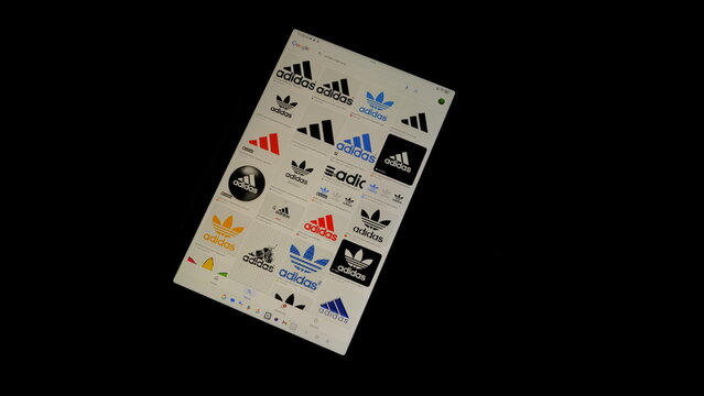 Tablet screen view with various sized Adidas logos, on a black background, August 1, 2026