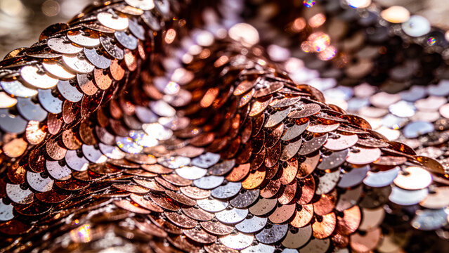 Sequin paillette fabric texture in metallic rose gold
