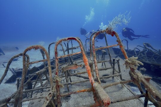 Close-up view of ferry benches, with a fish, diver in the background, meteor wreck dive site, Russian hydrofoil, Arguineguin, Gran Canaria, Spain, Europe, Atlantic