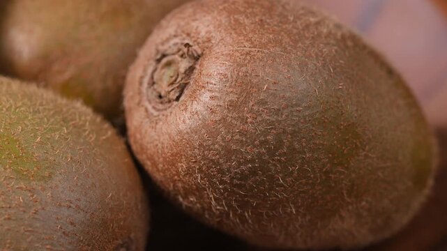 Fresh Kiwi Fruits in Wooden Bowl