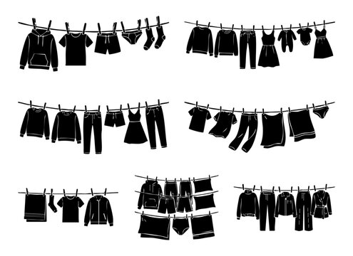 Black silhouette vector set of various clothes hanging on clotheslines with pegs.
