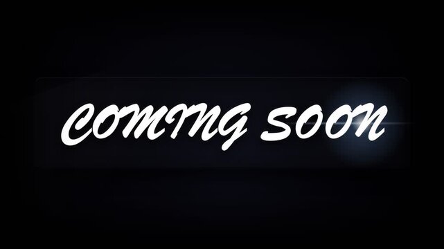 A bright cursive text displaying coming soon appears across a dark screen to inform viewers that a brand new product launch event or a highly anticipated premiere is occurring within the near