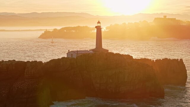 Aerial view of the Mouro Island Lighthouse at sunset, Santander, Spain