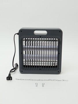Electric insect zapper trap on white background