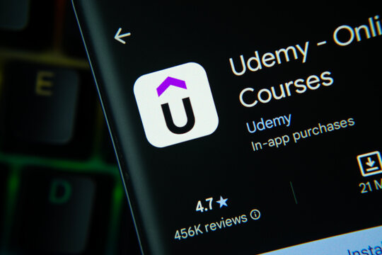San Francisco, United States - 24 July 2026: Udemy app page on Google Play Store is seen on a smartphone screen.