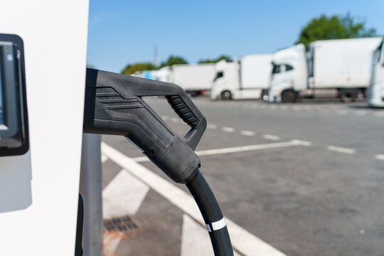 Heavy-duty electric truck charging station at a large highway transport hub