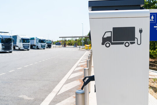 Heavy-duty electric truck charging station at a large highway transport hub