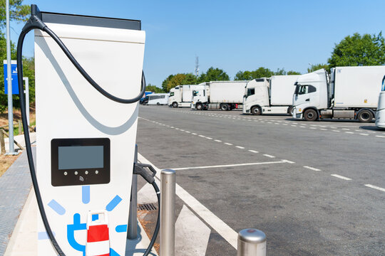 Heavy-duty electric truck charging station at a large highway transport hub