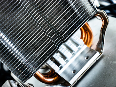 CPU Heatsink Cooling Fins with Copper Heat Pipes Close-Up, Computer Hardware Component Detail