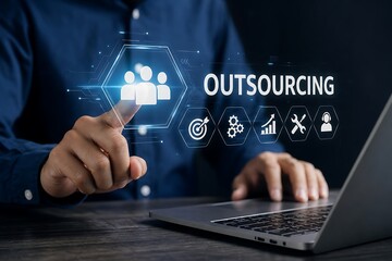 Fototapeta premium Business professional interacting with outsourcing concept hologram on laptop